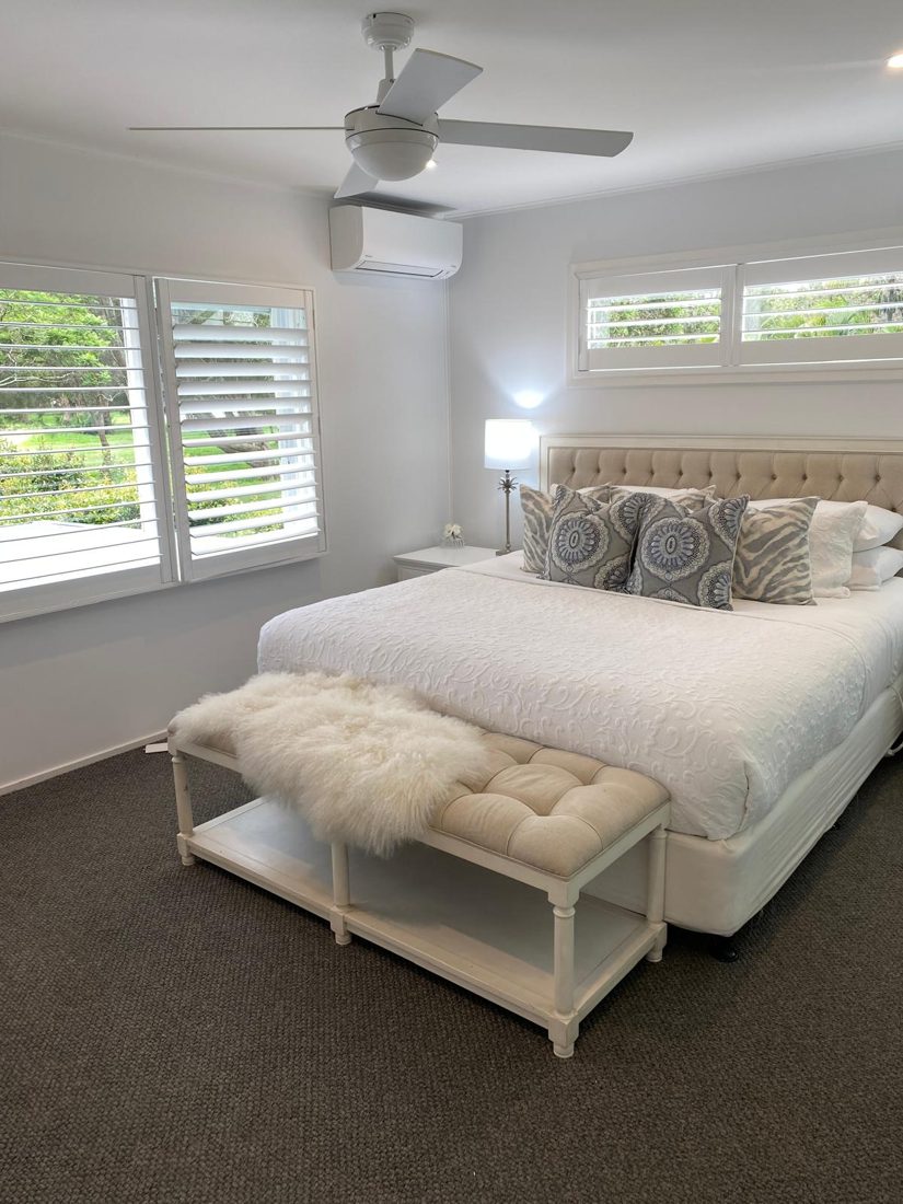 Wall-mounted split system installed in a bedroom